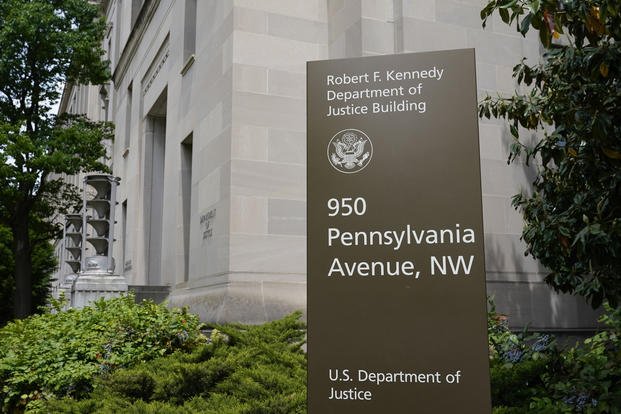 Sign outside the Robert F. Kennedy Department of Justice building