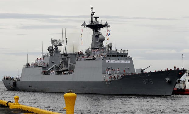 South Korean navy destroyer, the Munmu The Great, prepares to dock at the Manila South Harbor.