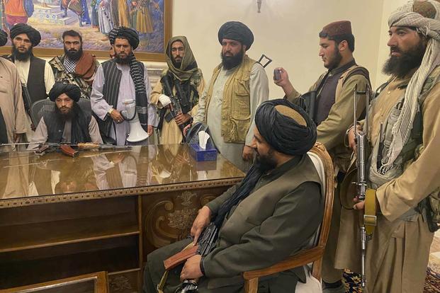 Taliban fighters take control of Afghan presidential palace