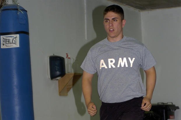 Soldier stays in shape by running laps.