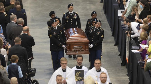 remains of Father Emil during Kapaun's funeral Mass