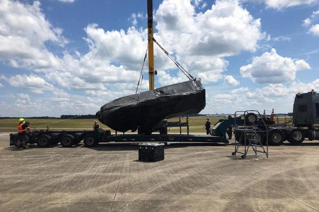 Fuselage from condemned F-35A Lightning II is prepared for transport.