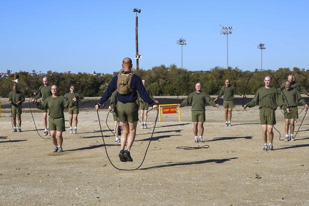 Marine recruits jump rope