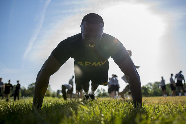 Army reservist performs push-ups during physical fitness test.