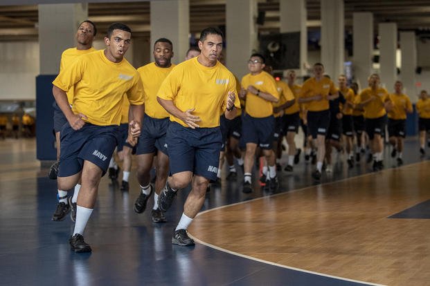 Recruits participate in the 1.5-mile run portion of their final physical fitness assessment.