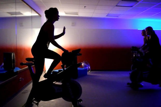 A spin cycle class is a great way to burn calories and get a non-impact workout.