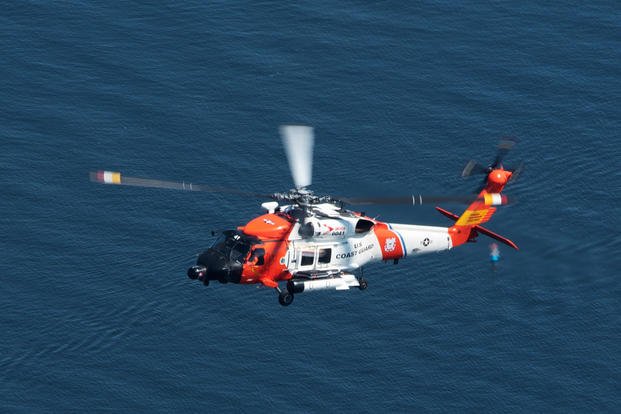 Coast Guard Air Station Cape Cod MH-60 Jayhawk helicopter flies near Newport, Rhode Island