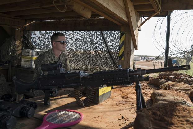 Infantryman provides base security while on watch in Somalia