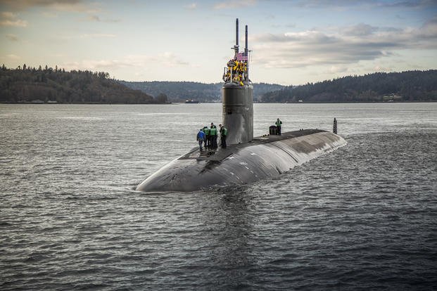 The Seawolf-class fast-attack submarine USS Connecticut departs Puget Sound.