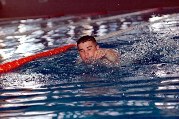 A soldier swims laps in Iraq.