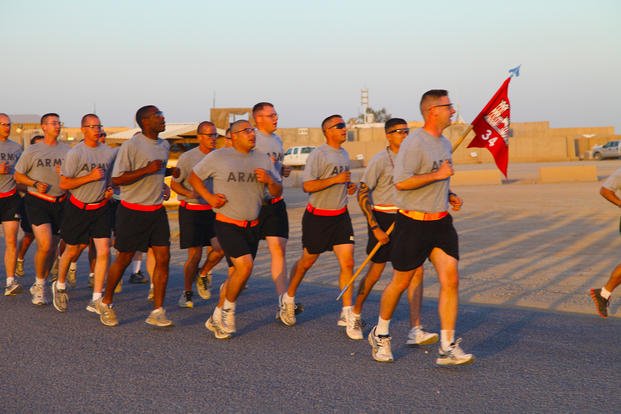 Army soldiers participate in a commemorative run.