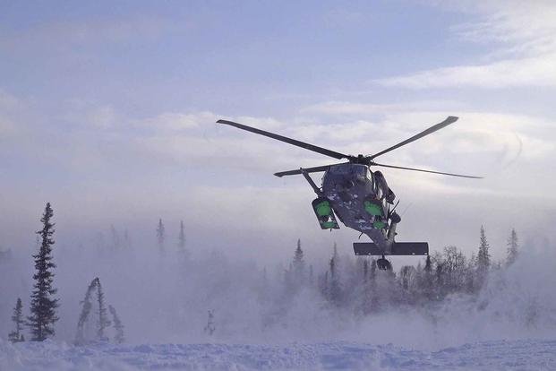 An Air National Guard HH-60G Pave Hawk participates in combat search and rescue training during Noble Defender in Alaska, Jan. 21, 2021. The exercise is a North American Air Defense Command Arctic air defense operation. 