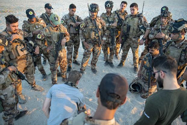 Soldiers with the 3rd Iraqi Special Operations Force receive training