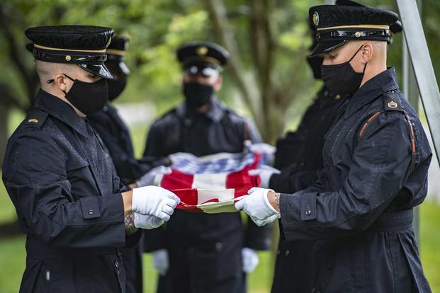 Military funeral honors for a soldier at Arlington National Cemetery