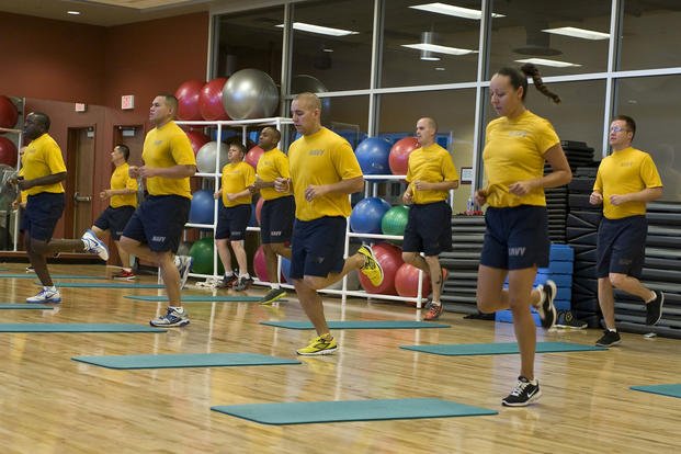 Members of Naval Recruiting District San Diego participate in group physical training at Nellis Air Force Base, Nevada.