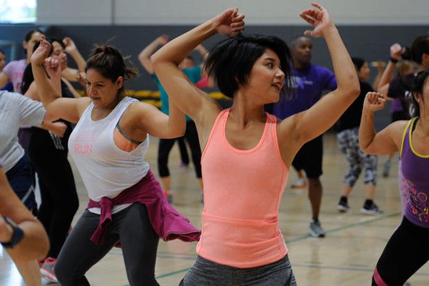 Mayuka Bolivar dances in a Zumba class held to raise awareness for domestic violence at Ramstein Air Base, Germany.