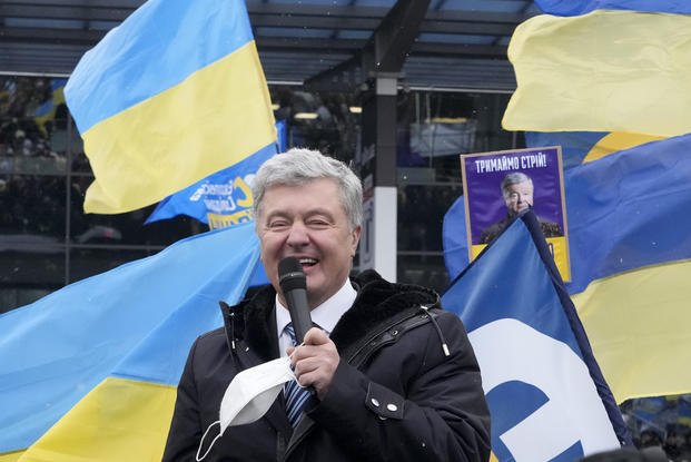 Former Ukrainian President Petro Poroshenko smiles.