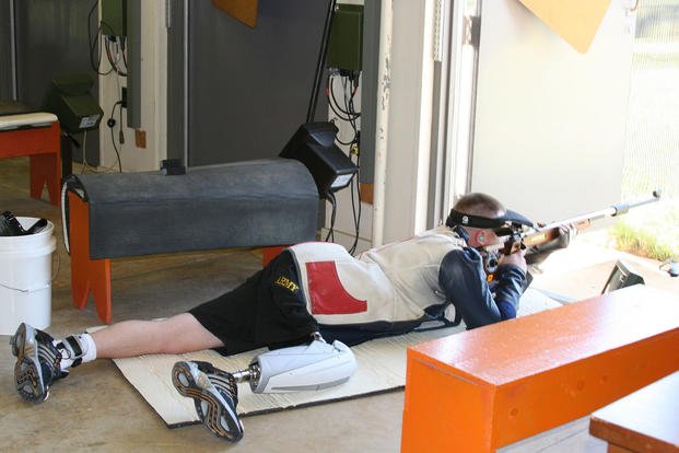 Sniper Josh Olson trains with a .22-caliber rifle.