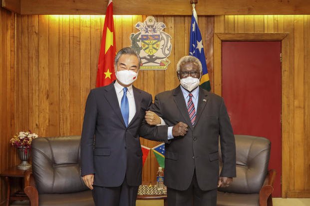 Prime Minister Manasseh Sogavare and Chinese Foreign Minister Wang Yi.