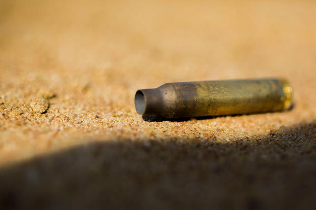 A 5.56mm cartridge after being fired from an M4 carbine rifle