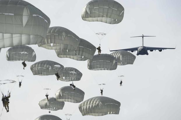 US Army Paratroopers With The 82nd Airborne Division Parachute