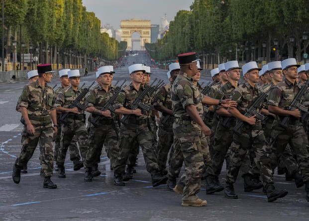 Foreign Legion march in parade on Bastille Day.