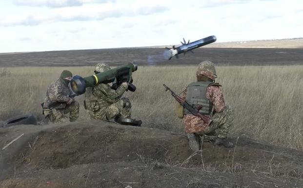 Ukrainian soldiers use a launcher with U.S. Javelin missiles during military exercises in Donetsk region
