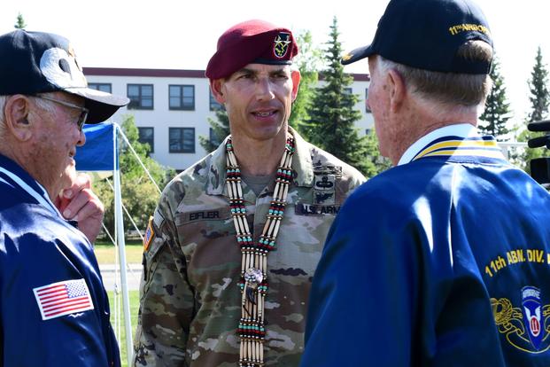 Maj. Gen. Brian Eifler speaks to 11th Airborne Division veterans at Joint Base Elmendorf-Richardson.