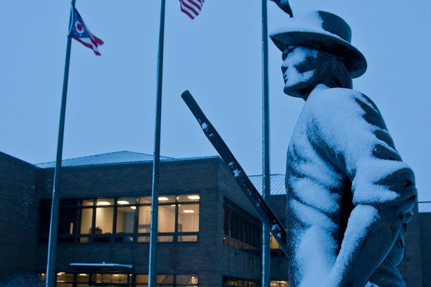 Ohio Air National Guard Minuteman statue is coated in the evening snow