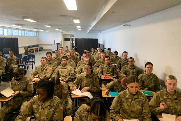 Space Force Guardians sit in the classroom during boot camp.