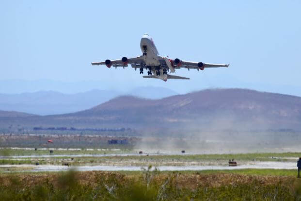 A Virgin Orbit Boeing 747-400 aircraft takes off from Mojave Air and Space Port.