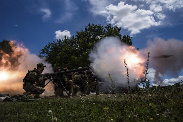 Ukrainian servicemen shoot with SPG-9 recoilless gun during training in Kharkiv region, Ukraine