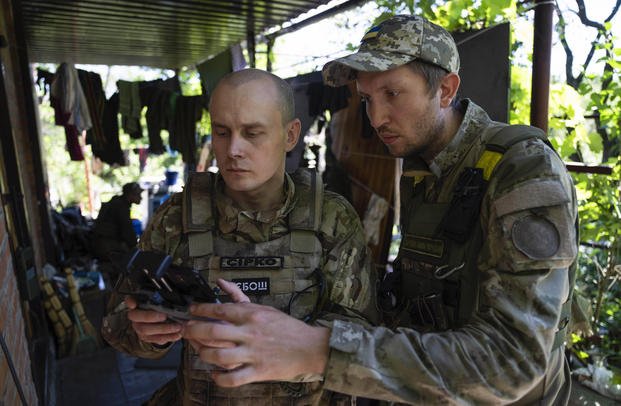 Ukrainian servicemen correcting artillery fire by drone at the frontline near Kharkiv, Ukraine