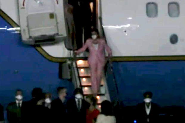 U.S. House Speaker Nancy Pelosi, exits a plane as she arrives in Taipei, Taiwan