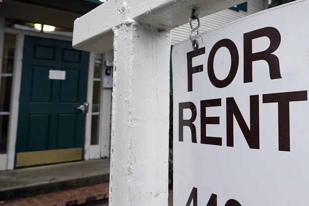 "For Rent" sign.