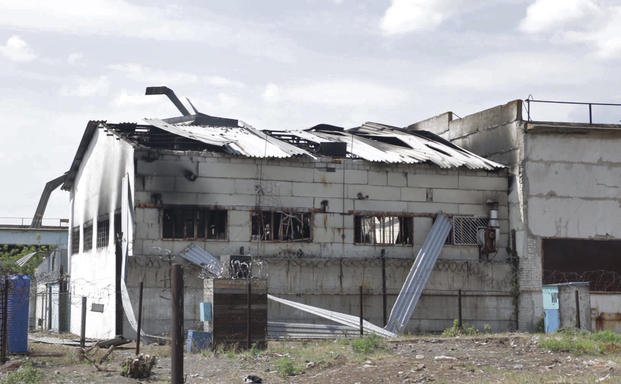 destroyed barrack at a prison in Olenivka, in an area controlled by Russian-backed separatist forces