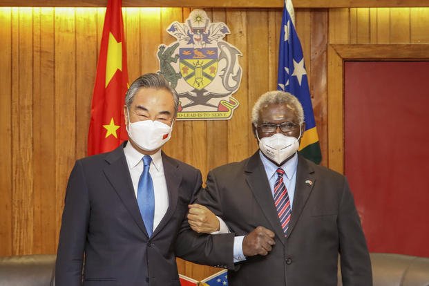 Solomon Islands Prime Minister Manasseh Sogavare with visiting Chinese Foreign Minister Wang Yi in Honiara
