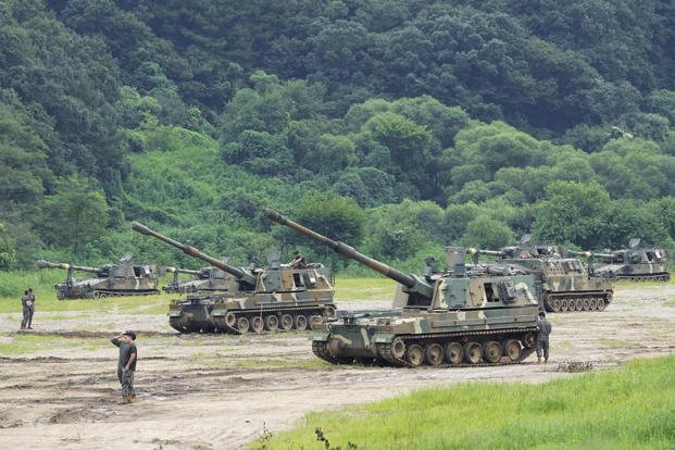 South Korean army K-9 self-propelled howitzers take positions in Paju, near the border with North Korea