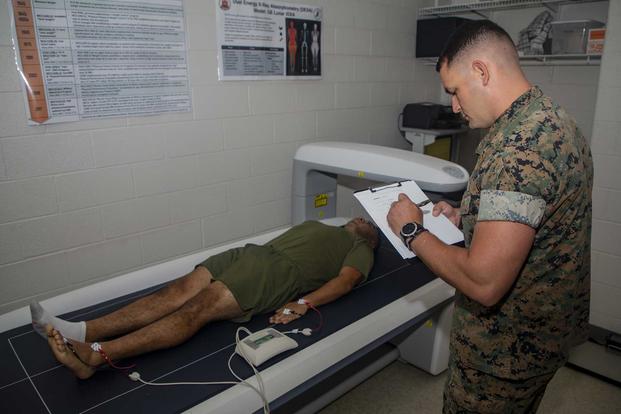 A U.S. Marine participates in a body composition assessment.