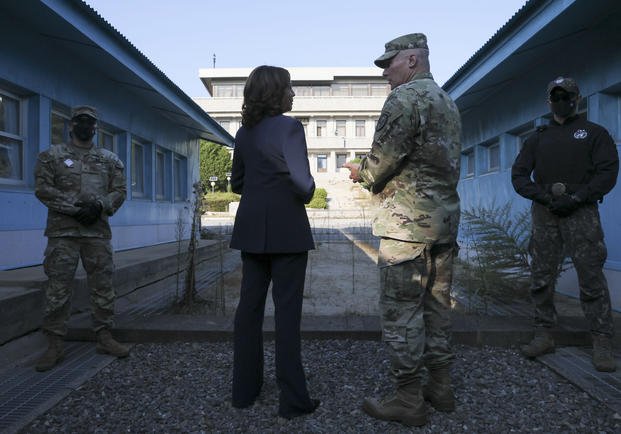 U.S. Vice President Kamala Harris stands next to the demarcation line at the demilitarized zone