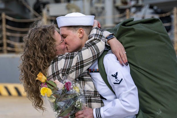 A sailor, assigned to the Arleigh Burke-class destroyer USS Gonzalez (DDG 66), embraces their partner upon returning to Naval Station Norfolk after a regularly scheduled deployment in the U.S. 5th Fleet and U.S. 6th Fleet areas of operations, Sept. 28, 2022. (Mass Communication 2nd Class Nathan T. Beard/U.S. Navy photo) A sailor, assigned to the Arleigh Burke-class destroyer USS Gonzalez (DDG 66), embraces their partner upon returning to Naval Station Norfolk after a regularly scheduled deployment in the U.S. 5th Fleet and U.S. 6th Fleet areas of operations.