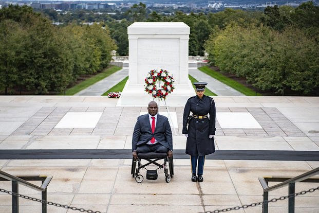 U.S. Army Col. (ret.) Gregory Gadson participates in a wreath-laying ceremony at the Tomb of the Unknown Soldier in Arlington, Virginia.