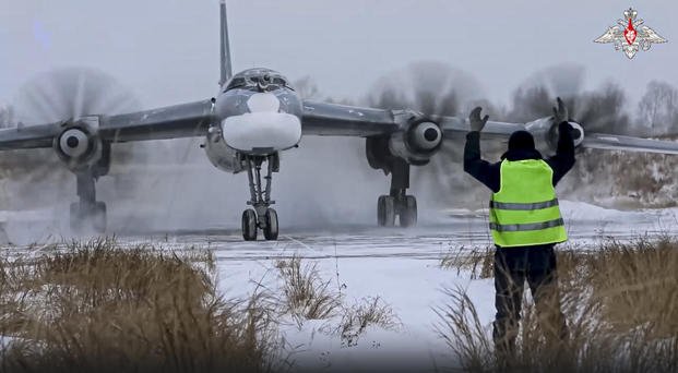 Tu-95 strategic bomber of the Russian air force taxiing before takeoff