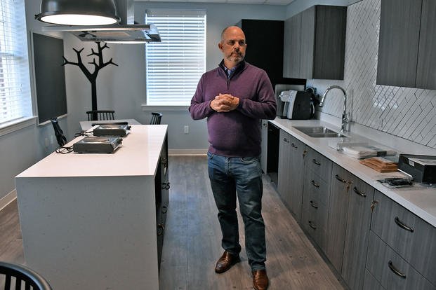 Tim O'Ferrall, general manager of Fort Meade Alliance, stands in the demonstration kitchen in the Education and Resiliency Center at Kuhn Hall at Fort Meade.