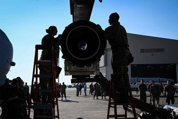 Airmen secure the Air-Launched Rapid Response Weapon to a B-52H.