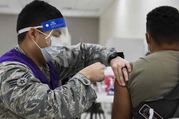 U.S. Air Force airman receives the Pfizer-BioNTech COVID-19 vaccine.