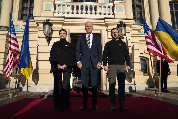 President Joe Biden, center, poses with Ukrainian President Volodymyr Zelenskyy