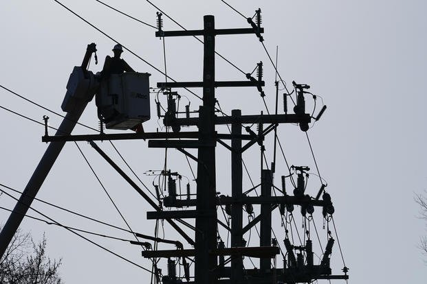 A worker works on the power lines in Annapolis, Md.