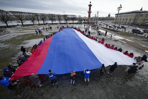 Russian flag during an action to mark the ninth anniversary of the Crimea annexation from Ukraine