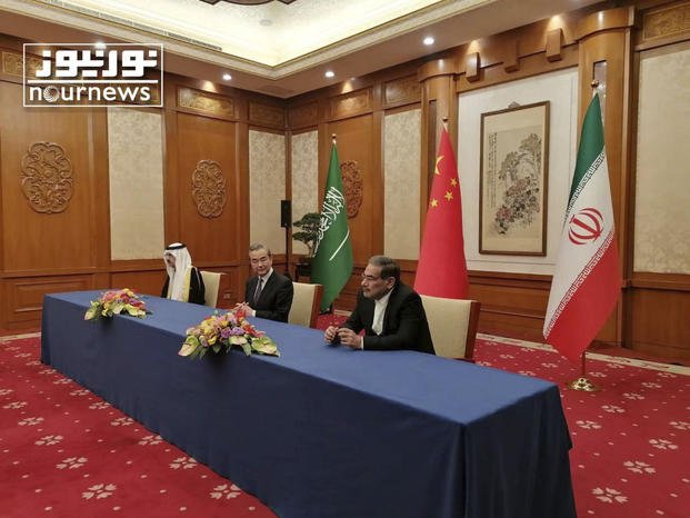 Signing ceremony between Iran and Saudi Arabia.